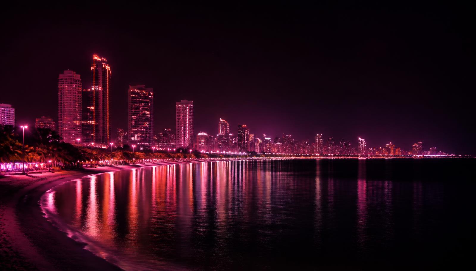 Pattaya, Thailand skyline at night over the bay