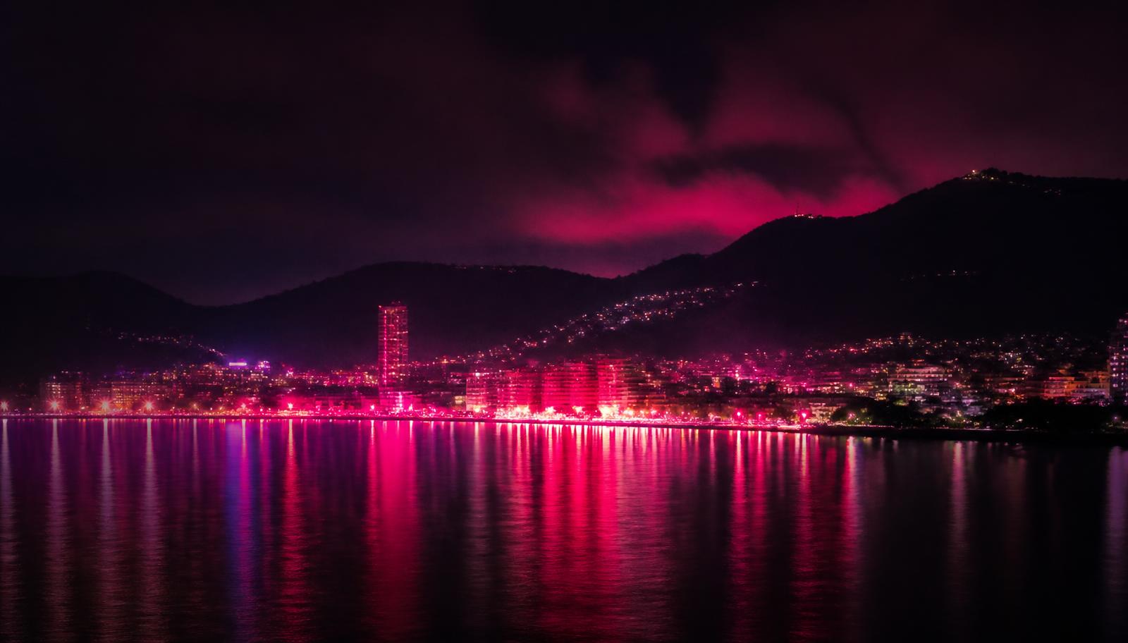 Phuket, Thailand skyline at night over the bay